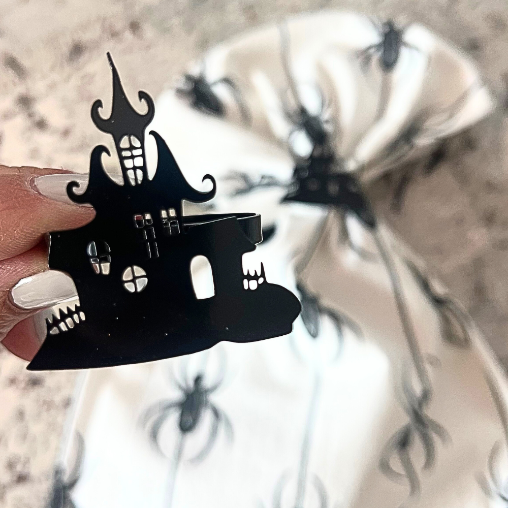 Haunted House Towel Topper™